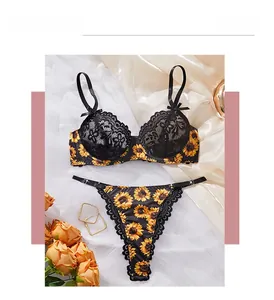 Macro detail of sexy sunflower embroidery lace bra and matching thong lingerie set