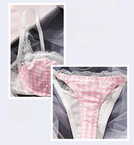 Detailed view of pink gingham lingerie set with white lace trim and slim straps