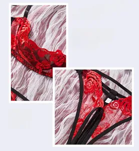 Detail of red rose embroidery on white mesh fabric with black elastic straps set