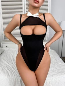 Detailed view of sexy black mesh bodysuit featuring a white bow and cutout waist design