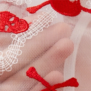 Sheer white mesh lingerie set with vibrant red heart embroidery and wavy edges