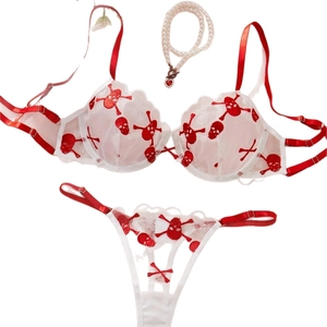 White sheer lace lingerie set with red skull embroidery and wavy edges for women