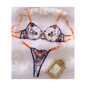 Floral embroidery lingerie set with blue and orange flowers on white mesh fabric