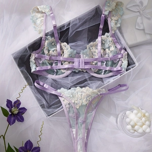 Lavender floral embroidery lingerie set with mesh bra and thong on white silk backdrop