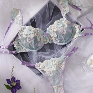 Light blue and lavender lace lingerie set with floral embroidery and ruffle sleeves