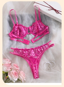 Close-up of rose red lace bra set with floral patterns and delicate mesh fabric