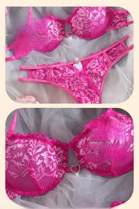 Detailed view of pink floral lace bra set with heart shaped diamond buckles and eyelash trim