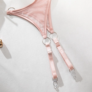 Detailed view of pink mesh garter belt with adjustable straps and silver metal clips