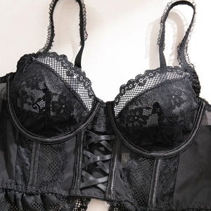 Macro shot of black lace bustier top with corset boning and ruffled shoulder straps
