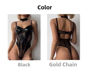Macro detail of sexy black faux leather bodysuit with mesh paneling and gold chain straps