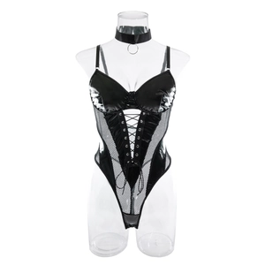 Detail of black faux leather bodysuit with mesh panels and front lace-up corset design