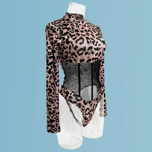 Detail of leopard print bodysuit with sheer black mesh panels and high neck collar