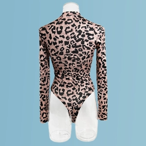 Rear view of long sleeve leopard print bodysuit with mesh panels and slim fit design
