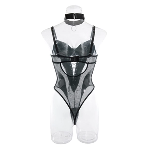 Macro detail of black mesh bodysuit showing crisscross back straps and choker collar