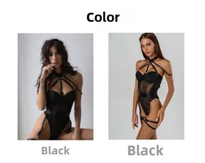 Close-up of black mesh bodysuit showing metal buckles and adjustable harness straps