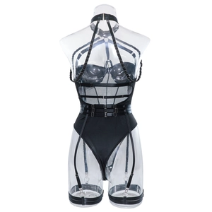 Rear view of black harness bodysuit featuring mesh panels and silver metal adjusters