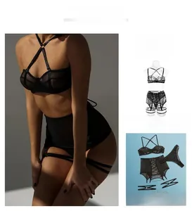 Detail of black sheer mesh teddy with cross halter neck and high waist lace-up straps