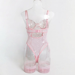 Detail of light pink floral lace bodysuit with back clasp and sheer mesh texture