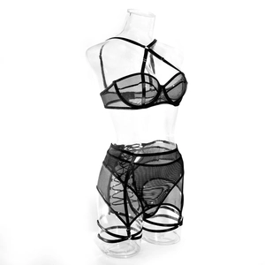 Detail of sheer mesh teddy with underwire cups and cross-strap halter neck design