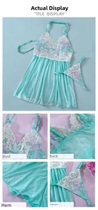 Detail view of mint green mesh lingerie set with floral embroidery and matching thong
