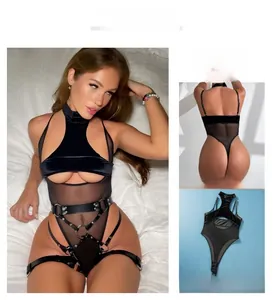 Detail showing sexy mesh bodysuit with velvet panels, harness straps, and metal rings