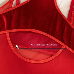 Detail of red velvet and sheer mesh splicing with precision stitching and hollow design