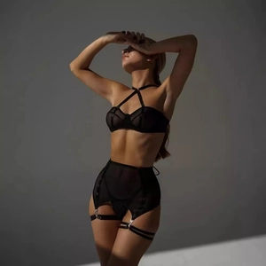Elegant black lace bodysuit with sheer mesh, underwire cups and cross neck straps