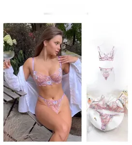 Detailed close-up of light purple lace lingerie set with floral embroidery and steel underwire