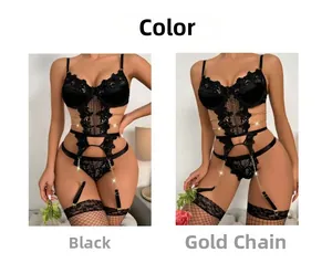 Detail of black lace teddy lingerie with intricate gold chain straps and mesh cut-outs