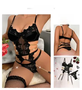 Black lace bodysuit with metal chains and matching fishnet stockings detail