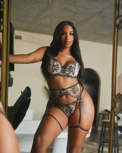 Detailed embroidery on black floral lace corset bodysuit with underwire bra cups