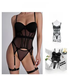 Detail view of black mesh lingerie set with lace-up back and adjustable garters