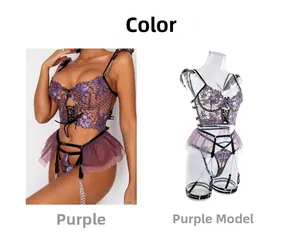 Detail of purple lace floral embroidery bodysuit with metal chains and garter straps