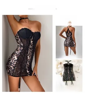 Detailed view of leopard print corset dress with black lace panels and garter straps