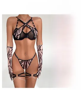 Detail view of brown zebra print mesh lingerie set with gloves and metal chain leg ring