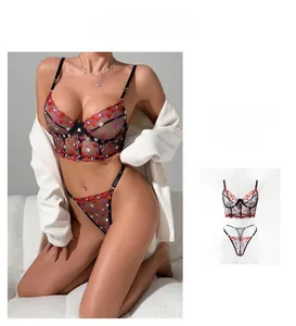 Lace bustier set with red heart embroidery, sheer mesh panels and supportive underwire