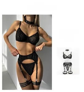 Detail of black leopard print mesh lingerie set with underwire bra and waist cincher