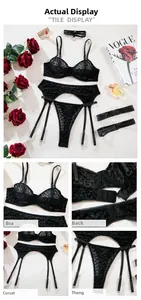 Detail view of black leopard print lace lingerie set with mesh fabric and metal hardware