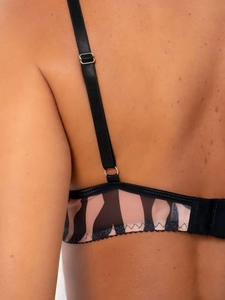 Detail of adjustable black straps and sheer zebra print mesh on back of lingerie