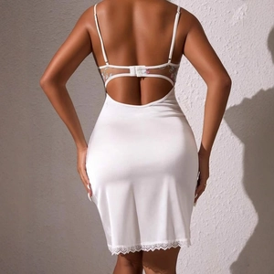 White silk camisole slip dress with floral embroidery and lace trim on back