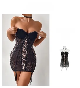 Detailed view of plus size leopard print bodysuit with black lace trim and garters