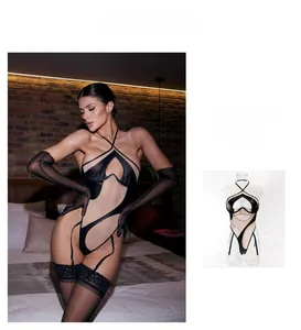 Detail view of sexy black PU leather and nude mesh patchwork bodysuit with garters