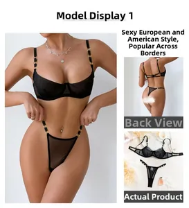 Detail view of black mesh lingerie set featuring gold rings and semi-sheer fabric textures
