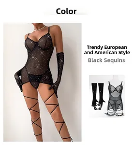 Close-up of black mesh lingerie set with silver sequins, long gloves and leg straps