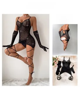 Detail of mesh lingerie set with sequins, matching long gloves and lace-up leg straps