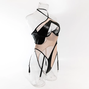 Detail of sexy PU leather bodysuit with mesh cutouts, halter neck, and garter straps