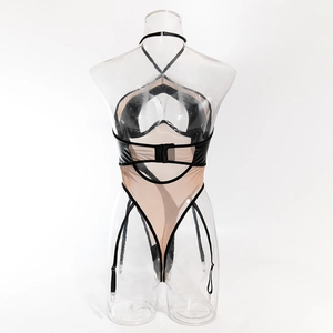 Detail of sexy PU leather and mesh bodysuit featuring garter straps and neck ties