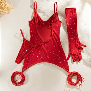 Detail view of red mesh bodysuit with sequins, matching thong and long arm gloves
