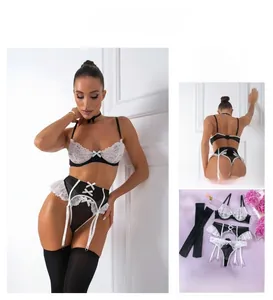 Detailed view of maid style lace lingerie set with white bows and black stockings