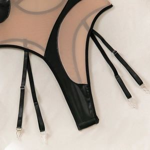 Detail of sexy bodysuit featuring black faux leather and mesh patchwork with suspender straps